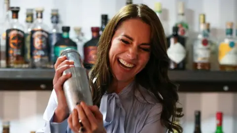 The Princess of Wales mixes a cocktail