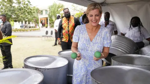 PA Media The Countess of Wessex with steel drums