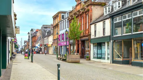A largely empty high street 