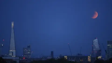 Getty Images Partial lunar eclipse on 16 July 2019, from London