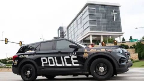 Police respond to the scene of Wednesday's shooting at St Francis Hospital