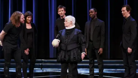 Getty Images (L-R) Tim Minchin, Harriet Walter, David Tennant, Dame Judi Dench, Paapa Essiedu and Benedict Cumberbatch perform at the RSC's Shakespeare Live! in 2016