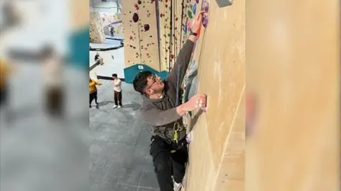 Ben Wollen Ben Wollen climbing