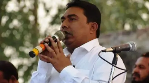 Sanjay Das Shahjahan Sheikh at an event