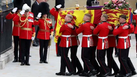 Reuters Coffin bearers