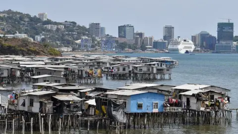 Getty Images Makeshift huts in Port Moresby in 2018
