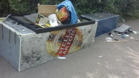 South Gloucestershire Council Waste dumped on country lane, including big beer fridges and generic rubbish