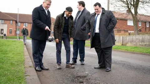 Rishi Sunak and candidates in Darlington road