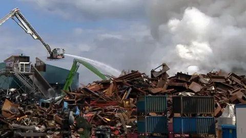 Firefighters dealing with fire