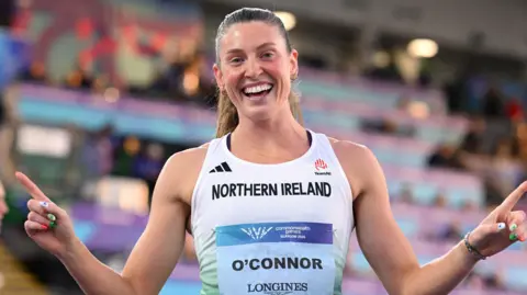 Kate O'Connor celebrates her gold medal