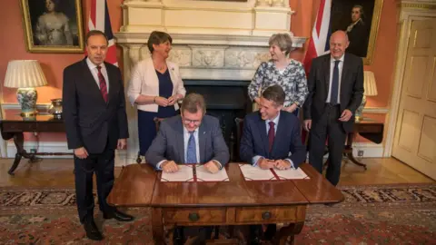 Huw Evans picture agency DUP-Tory deal signed