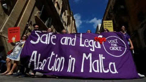 Reuters People demonstrate against Malta's total ban on abortion in Valletta, Malta, September 25, 2022