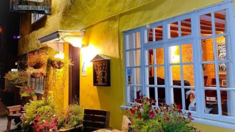 Julie Penney The front of the Swan Inn in Monks Eleigh