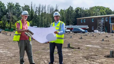 Grow Ltd Guernsey Electricity's Stuart Blondel and Grow Ltd's Angus Bodman