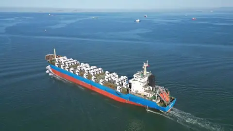 Getty Images Ship carrying trucks