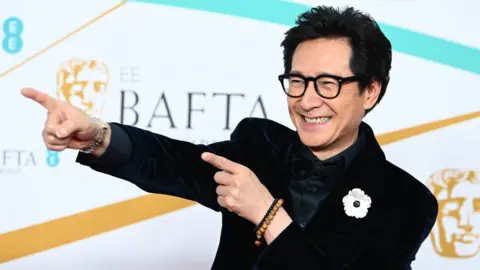 Getty Images Ke Huy Quan attends the EE BAFTA Film Awards 2023 at The Royal Festival Hall on February 19, 2023 in London