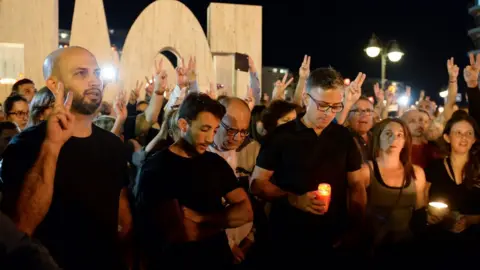 AFP Candle-lit vigil for slain journalist, 16 Oct 17