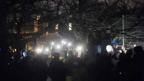 PA Media Mourners gather to pay respects to Harry Pittman