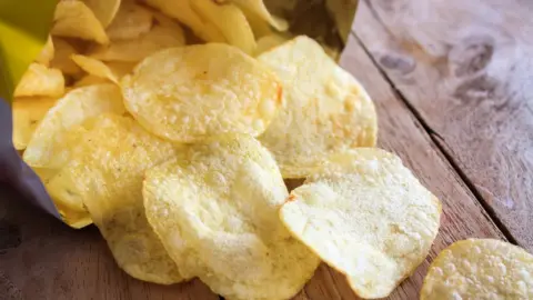 Getty Images Packet of crisps on a table