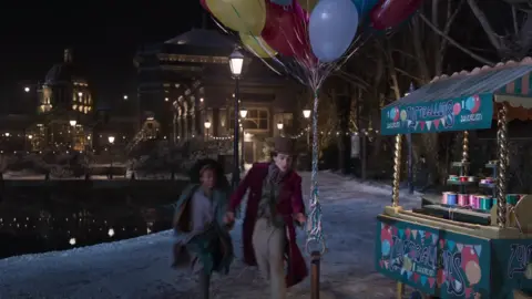 Warner Bros Timothée Chalamet in St Albans in a still from the Wonka trailer