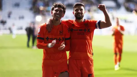 Getty Images Sam Morsy and Jeremy Sarmiento following Ipswich Town's big win at Coventry in midweek, which means a solitary point at the weekend would secure automatic promotion"