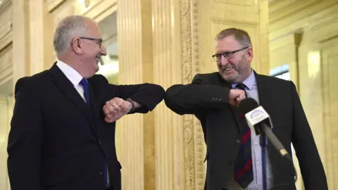 PAcemaker UUP chairman Danny Kennedy (left) congratulates Mr Beattie on Monday