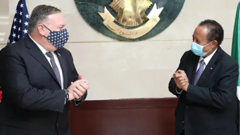 Sudan government Mike Pompeo w=with Sudan's PM