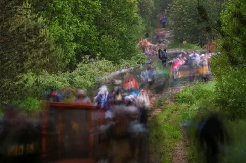 Alexey Malgavko / Reuters Pilgrims on the road