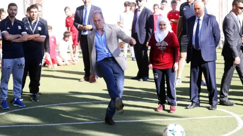 Getty Images Prince William meets young footballers in Ramallah