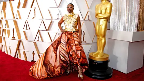 Reuters Billy Porter on the red carpet wearing a dress