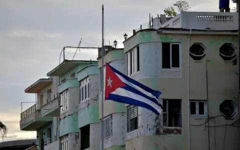AFP/Getty Images A Cuban national flag flies at half-mast in Havana on May 19, 2018.