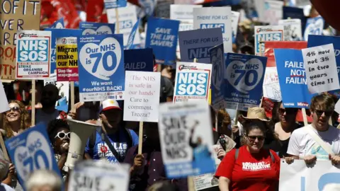 AFP/Getty Images Protesters marching through London