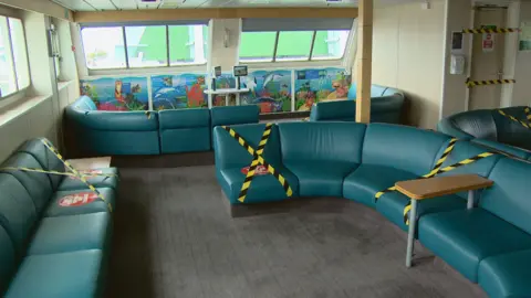 Onboard a ferry to Arran with physical distancing measures in place