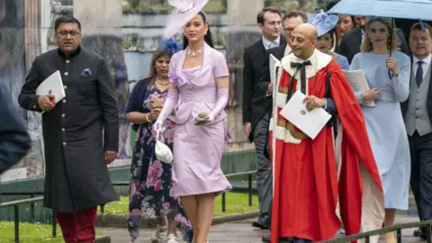 Jane Barlow/PA Katy Perry leaves Westminster Abbey following the coronation ceremony of King Charles III and Queen Camilla in central London.