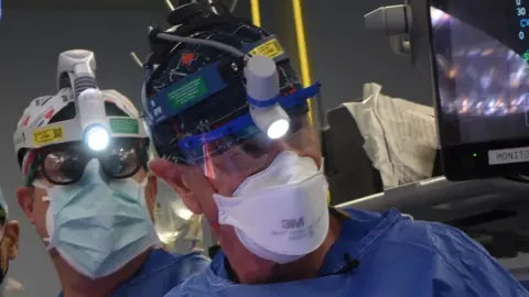 Surgeons during the transplant operation