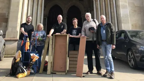 Tim Hill Peregrine Falcon nest tray fitting team at St Albans Cathedral