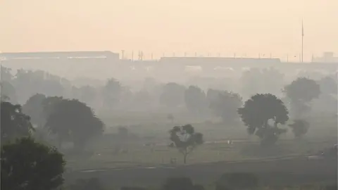 Getty Images Delhi Metro rail seen near Yamuna Bank on a smoggy morning as Air pollution rise in Delhi-NCR, on October 19, 2023 in New Delhi, India.