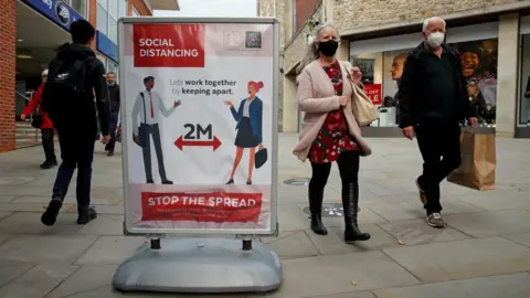 Reuters Social distancing sign in Colchester