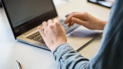 Getty Images Person on laptop