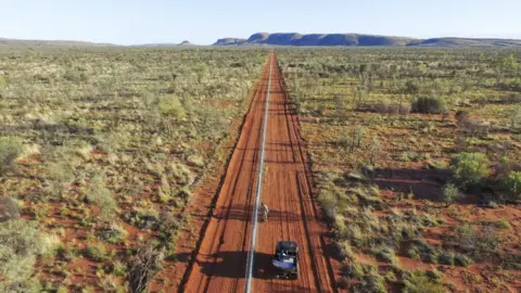 WAYNE LAWLER/AUSTRALIAN WILDLIFE CONSERVANCY The 44km-long electric fence in the Northern Territory