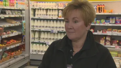 Linda Williams in her convenience store in Oxgangs