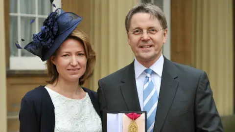Getty Images Sir Jeremy Heywood with wife Suzanne