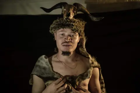 AFP A participant backstage