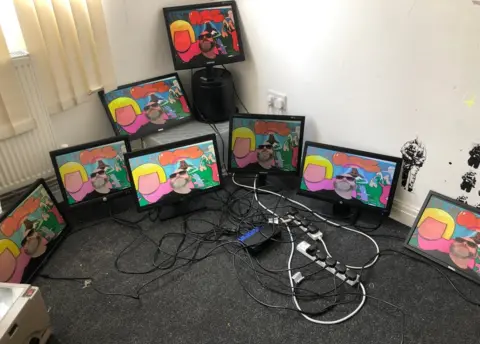 Sean Azzopardi TV screens on the floor