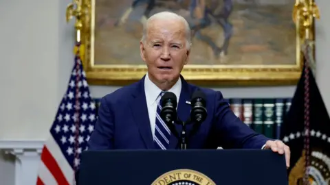 Getty Images Joe Biden speaking at the White House