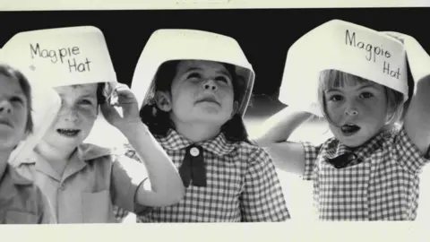 Getty Images Children at a Newcastle school pictured with their magpie hats in 1984