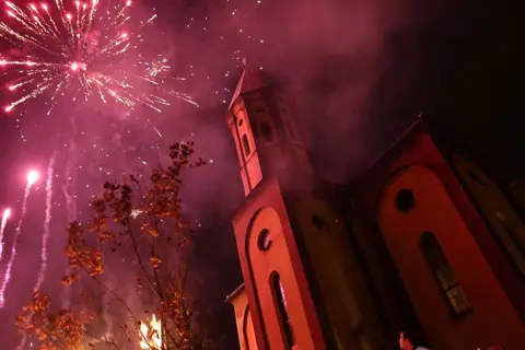 Dado Ruvic / Reuters Fireworks above the Church of the Holy Mother of God