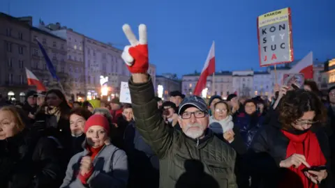 Getty Images Protesters gather in Poland to support judges