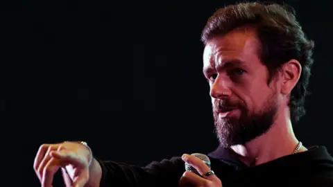 Getty Images Twitter CEO and co-founder Jack Dorsey gestures while interacting with students at the Indian Institute of Technology, New Delhi.