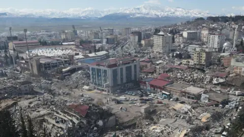 EPA Collapsed buildings in the aftermath of a powerful earthquake in the centre of Kahramanmaras